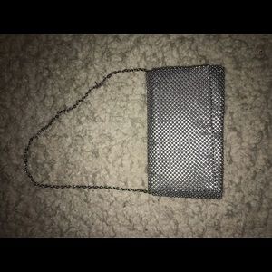 shiny silver clutch